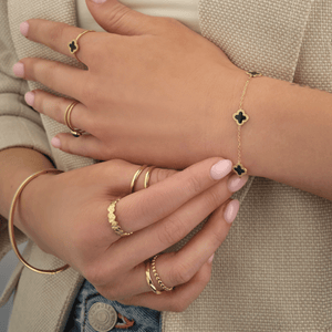 Armband Kleeblätter Gold/schwarz Armband Kleeblätter Gold/schwarz