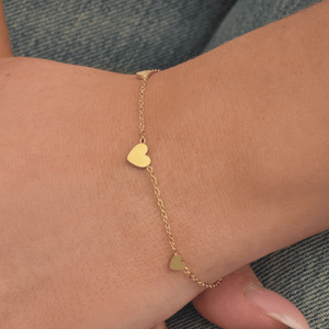 Armband mit drei Herzanhängern Gold Armband mit drei Herzanhängern Gold