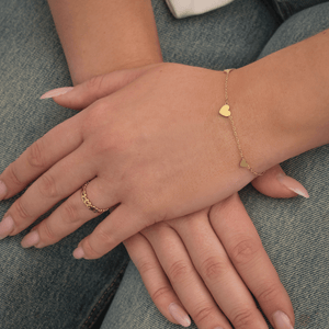 Armband mit drei Herzanhängern Gold Armband mit drei Herzanhängern Gold