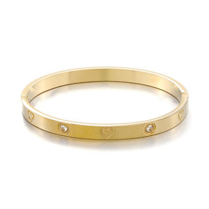 Bangle mit Herzchen Gold Bangle mit Herzchen Gold