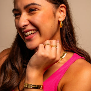 Bangle mit Herzchen Gold Bangle mit Herzchen Gold