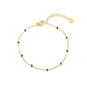 Goldarmband mit schwarzen Kugeln Goldarmband mit schwarzen Kugeln