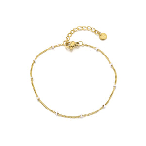 Goldarmband mit weißen Kugeln Goldarmband mit weißen Kugeln