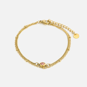 Zweischichtiges Armband mit rosa Stein Gold Zweischichtiges Armband mit rosa Stein Gold